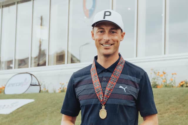 Lundin's James White shows off the Leven Gold Medal after his two-shot success. Picture: Rachael McQueen