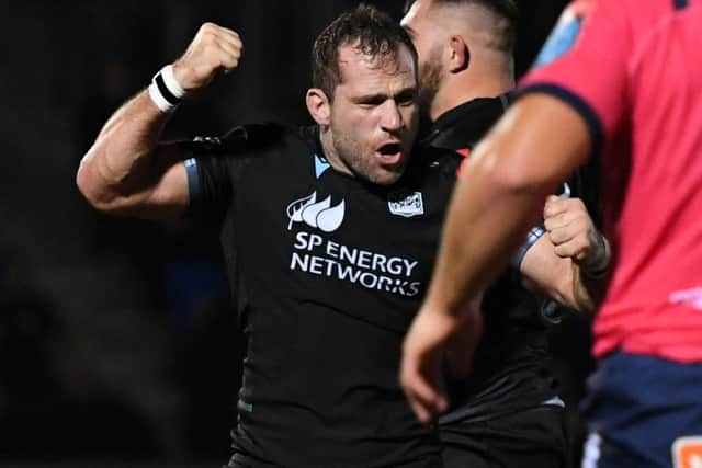 Warriors' Fraser Brown celebrates a try at Scotstoun. (Photo by Ross MacDonald / SNS Group)