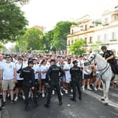 Eintracht Frankfurt fans arrive at the Ramon Sanchez Pizjuan guided by police on horseback. (Photo by David Ramos/Getty Images)