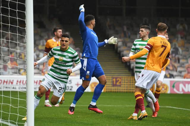Mohamed Elyounoussi scores to put Celtic ahead at Fir Park. Picture: SNS
