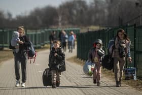 Refugees fleeing Ukraine may struggle to find sanctuary in the UK because of Home Office red tape and delays (Picture: Angelos Tzortzinis/AFP via Getty Images)