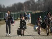 Refugees fleeing Ukraine may struggle to find sanctuary in the UK because of Home Office red tape and delays (Picture: Angelos Tzortzinis/AFP via Getty Images)