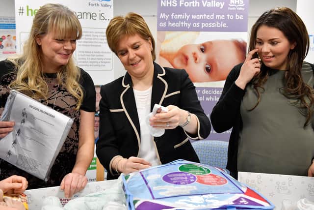 First Minister Nicola Sturgeon gives out Scotland's first baby boxes at Clackmannanshire Community Health Centre on December 28, 2016 in Sauchie, Scotland. (Photo: Jeff J Mitchell/Getty Images)