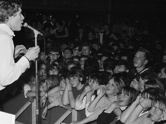 Manfred Mann at the Palais de Danse 1964 - vocalist Paul Jones at the microphone and a section of the audience.