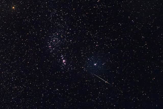 The Geminids' rocky composition means they travel more slowly through the sky, and burn up brighter than other meteors (Photo: YE AUNG THU/AFP via Getty Images)