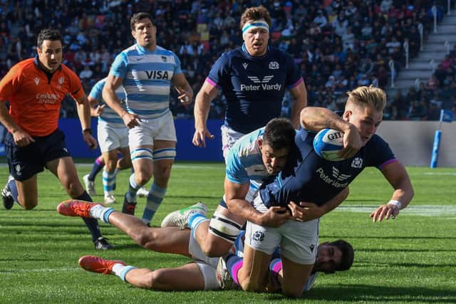 Duhan van der Merwe show impressive strength to score Scotland's first try against Argentina. Photo by Gustavo Garello/AP/Shutterstock