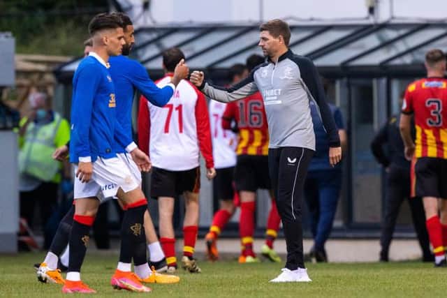 Rangers Manager Steven Gerrard with Connor Goldson at full time during a pre-season friendly between Partick Thistle and Rangers at Firhill, on July 05, 2021, in Glasgow, Scotland. (Photo by Craig Williamson / SNS Group)