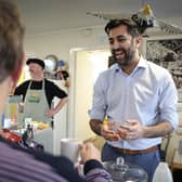 Humza Yousaf, seen at a community cafe in Dalkeith, claims there was a cock-up, not a conspiracy, over the SNP's membership figures (Picture: Jeff J Mitchell/Getty Images)