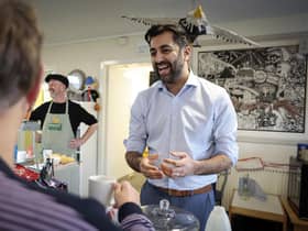 Humza Yousaf, seen at a community cafe in Dalkeith, claims there was a cock-up, not a conspiracy, over the SNP's membership figures (Picture: Jeff J Mitchell/Getty Images)