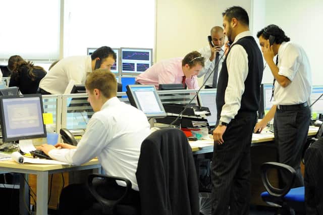 Some research suggests that sitting can be as bad for our health as smoking (Picture: Fiona Hanson/PA)