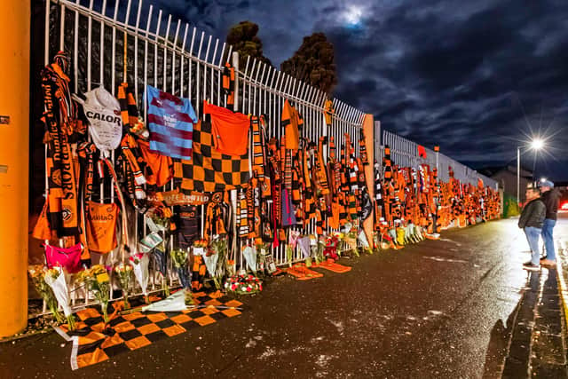 Tributes - including a Dundee FC strip - are left for Jim McLean at Tannadice Park shortly after his death in December last year (Photo by Roddy Scott / SNS Group)