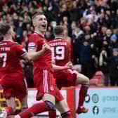 Aberdeen celebrate Lewis Ferguson's winning goal against Hearts. (Photo by Craig Foy / SNS Group)