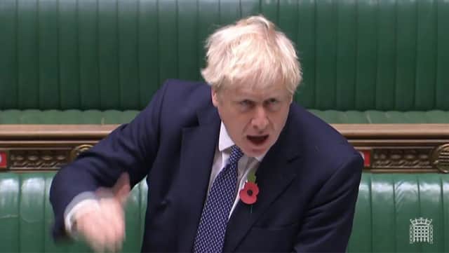 Britain's Prime Minister Boris Johnson speaking during Prime Minister's Question time (PMQs) in the House of Commons in London on November 4, 2020.