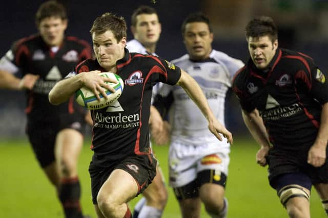 Phil Godman bursts through to score a try for Edinburgh against Castres at Murrayfield in the Heineken Cup in January 2009.  (Picture: Craig Watson/SNS)