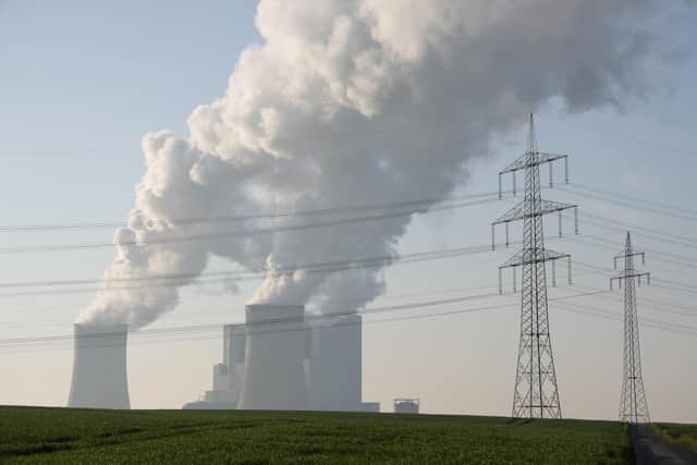 Electricity pylons stand as steam rises from cooling towers at the Neurath coal-fired power plant on April 22, 2022 at Neurath, Germany. According to data from 2020, Neurath is Europe's second biggest emitter of CO2. Picture: Sean Gallup/Getty Images