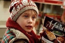 Pictured here in Home Alone, in Home Alone 2, Kevin McAllister ends up boarding the wrong plane and is stranded hundreds of miles away from his family.