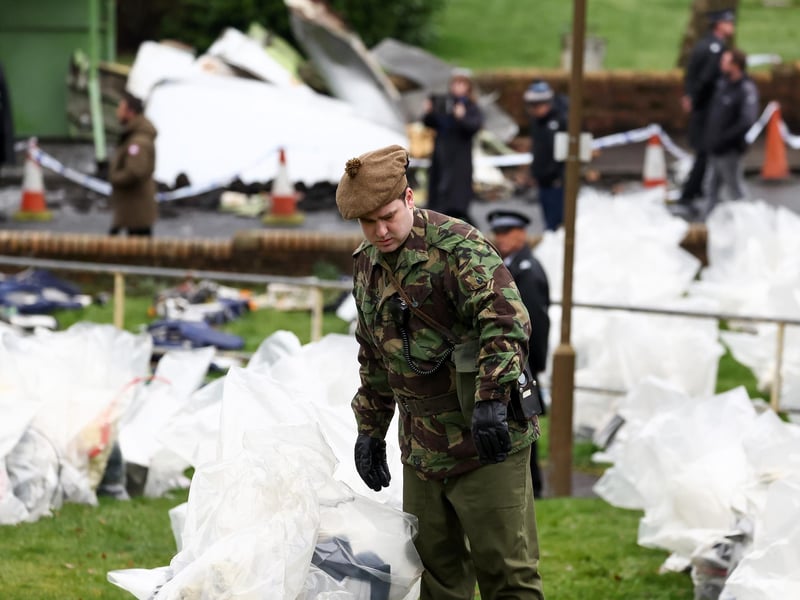 On set, actors portraying police officers and soldiers were also pictured