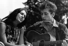 Bob Dylan, seen with Joan Baez in 1963, repurposed the ballad Lord Randal to write A Hard Rain’s A-Gonna Fall (Picture: Rowland Scherman/National Archive/Newsmakers/Getty Images)