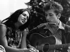Bob Dylan, seen with Joan Baez in 1963, repurposed the ballad Lord Randal to write A Hard Rain’s A-Gonna Fall (Picture: Rowland Scherman/National Archive/Newsmakers/Getty Images)
