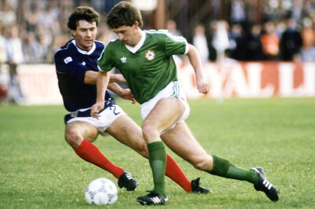 Kevin Sheedy in action for Republic of Ireland against Scotland in 1986, Ray Stewart is shadowing him.