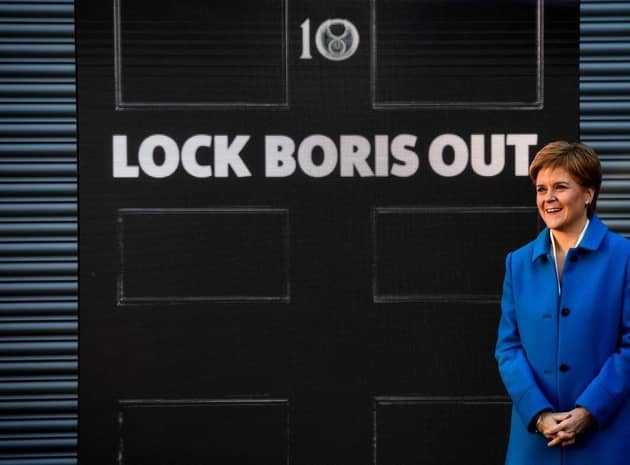 First Minister Nicola Sturgeon poses with an LED display. Picture: Andy Buchanan/AFP/Getty