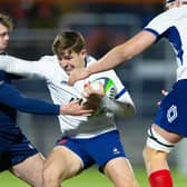 Scotland's Geordie Gwynn challenges France's Xan Mousques during an Under-20's Six Nations match at Hive Stadium, on February 09, 2024. (Photo by Ewan Bootman / SNS Group)