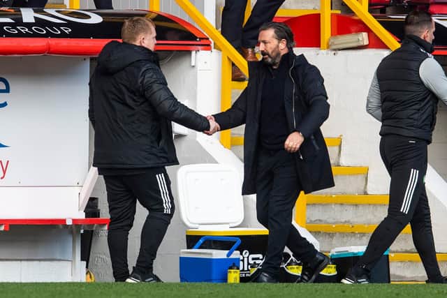 Aberdeen manager Derek McInnes shakes hands with Neil Lennon at full-time. Picture: SNS