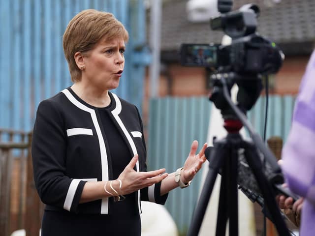 First Minister Nicola Sturgeon speaks to the media during her visit to Buchanan Street Residential Children's Home in Coatbridge. Picture: Andrew Milligan/PA Wire