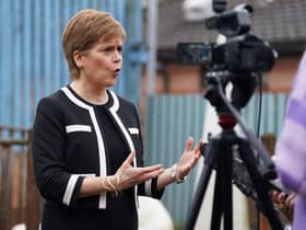 First Minister Nicola Sturgeon speaks to the media during her visit to Buchanan Street Residential Children's Home in Coatbridge. Picture: Andrew Milligan/PA Wire