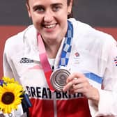 Laura Muir shows off her silver medal after her stunning run in the Olympic women's 1500m in Tokyo. Picture: Ryan Pierse/Getty Images