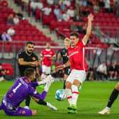 Dundee United goalkeeper Mark Birighitti tries to stop AZ Alkmaar's Milos Kerkez during a chastening night for the Scottish team.