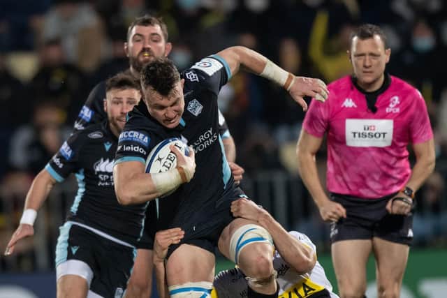 Glasgow's Jack Dempsey runs with the ball during the European Rugby Champions Cup clash with La Rochelle.