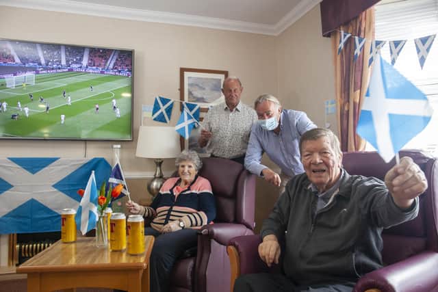 Alan Rough (second right) with Annie Moffat, Jim Kennedy and Eddie Craig at Renaissance Care's Croftbank House Care Home in Glasgow.
