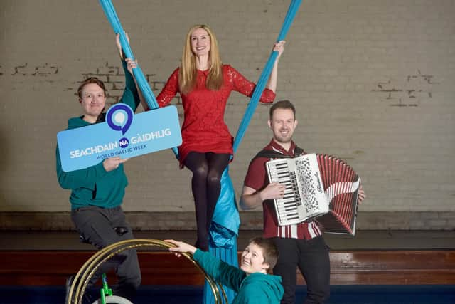 World Gaelic Week director Joy Dunlop launches 'Seachdain Na Gàidhlig' at Paisley Community Circus Paisley with  help from Gaelic speaker and acrobatic educator Kit Rodman-Orr (front), circus director Scott Craig, on left and Grant McFarlane, Seachdain na Gaidhlig project manager. Julie Howden