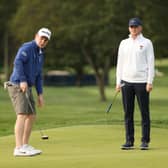 Amateur Sandy Scott watches Bob MacIntyre during a practice round prior to the 120th US Open at Winged Foot Golf Club in Mamaroneck, New York, last September. Picture: Gregory Shamus/Getty Images.