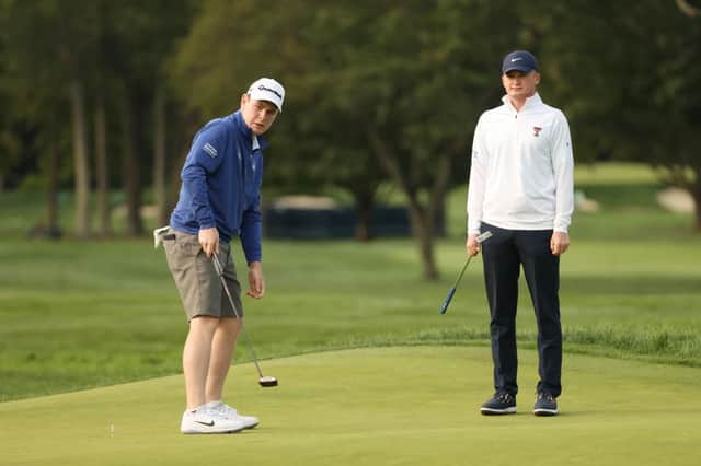 Amateur Sandy Scott watches Bob MacIntyre during a practice round prior to the 120th US Open at Winged Foot Golf Club in Mamaroneck, New York, last September. Picture: Gregory Shamus/Getty Images.
