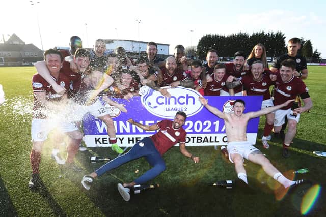 Kelty Hearts players celebrate after being crowned League 2 champions following a 1-0 win over Stenhousemuir at New Central Park. (Photo by Ross MacDonald / SNS Group)