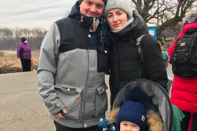 Alex Sedov, with his wife and son, near the border between Ukraine and Poland