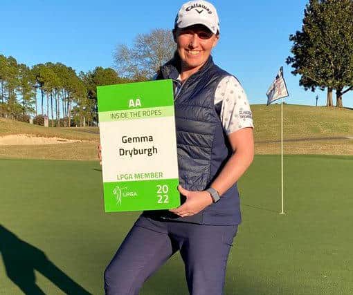 Gemma Dryburgh shows off her LPGA Tour card after finishing joint-22nd in the eight-round Q-Series in Alabama