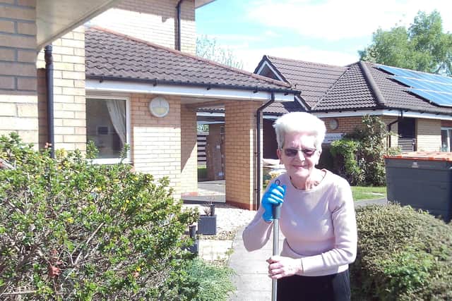 Resident May Price at HC-One Scotland’s Hatton Lea Care Home gardening