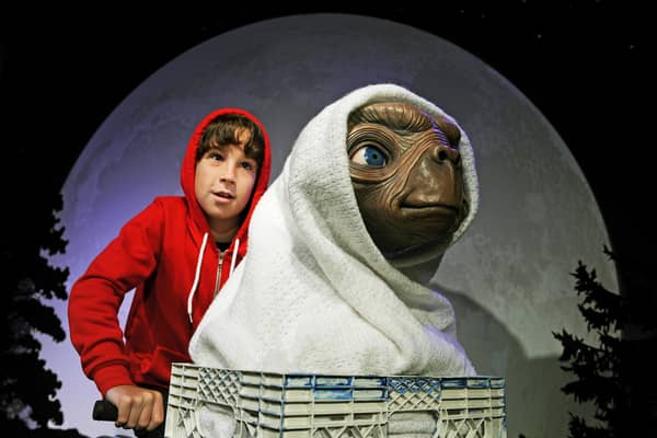 A re-enactment of the iconic scene from Steven Spielberg's movie classic, ET the Extra-Terrestrial (Picture: Greg Wood/AFP via Getty Images)