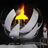 Tennis superstar Naomi Osaka lit the flame to signify the start of Tokyo's Olympics