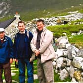 Murdo, middle, and his brother Alexander (right) with their father on a trip to St Kilda to mark his 80th birthday in 2009.