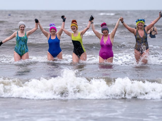 Swimmers take a dip in the Firth of Forth at Portobello in Edinburgh, to mark International Women's Day. International Women's Day Photo: Jane Barlow/PA Wire