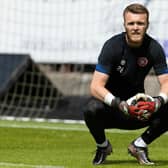 Hearts goalkeeper Zander Clark felt an issue in his leg during the warm-up against Dunfermline.