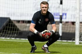 Hearts goalkeeper Zander Clark felt an issue in his leg during the warm-up against Dunfermline.