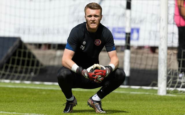 Hearts goalkeeper Zander Clark felt an issue in his leg during the warm-up against Dunfermline.