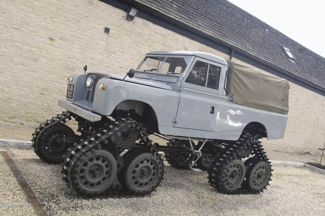 The tracks were added to enable the vehicle to negotiate boggy ground, and for use in bomb disposal.