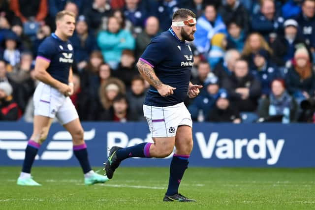 Scotland's Jamie Bhatti leaves the field after being shown the yellow card early in the second half.  (Photo by Paul Devlin / SNS Group)