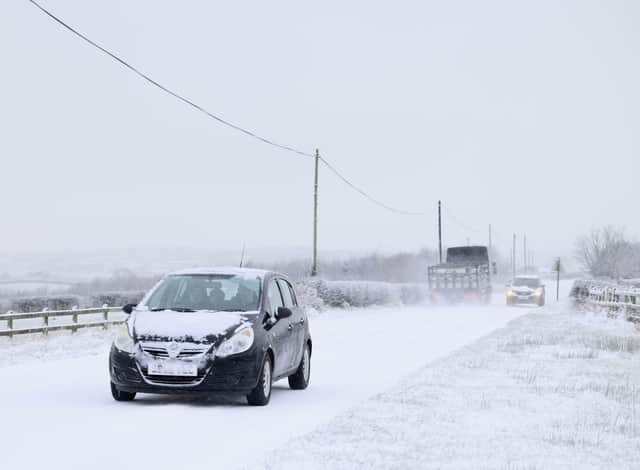 The roads in Armoy this morning proved difficult to pass with heavy overnight snow and ice.

As sub-zero temperatures swept across Northern Ireland overnight, warnings are in place for drivers to take care on roads.

Monday was a bitterly cold evening, with snow and ice taking hold from late afternoon.

The north west has been particularly badly hit.

Police in Derry said they dealt with 19 crashes in the city as well as city, Strabane, Slaughtmanus and Donemana.

"If you are driving, please slow down and keep a safe distance from the vehicle in front of you," police said.

A number of schools have also been closed.
Photo Stephen Davison/Pacemaker Press